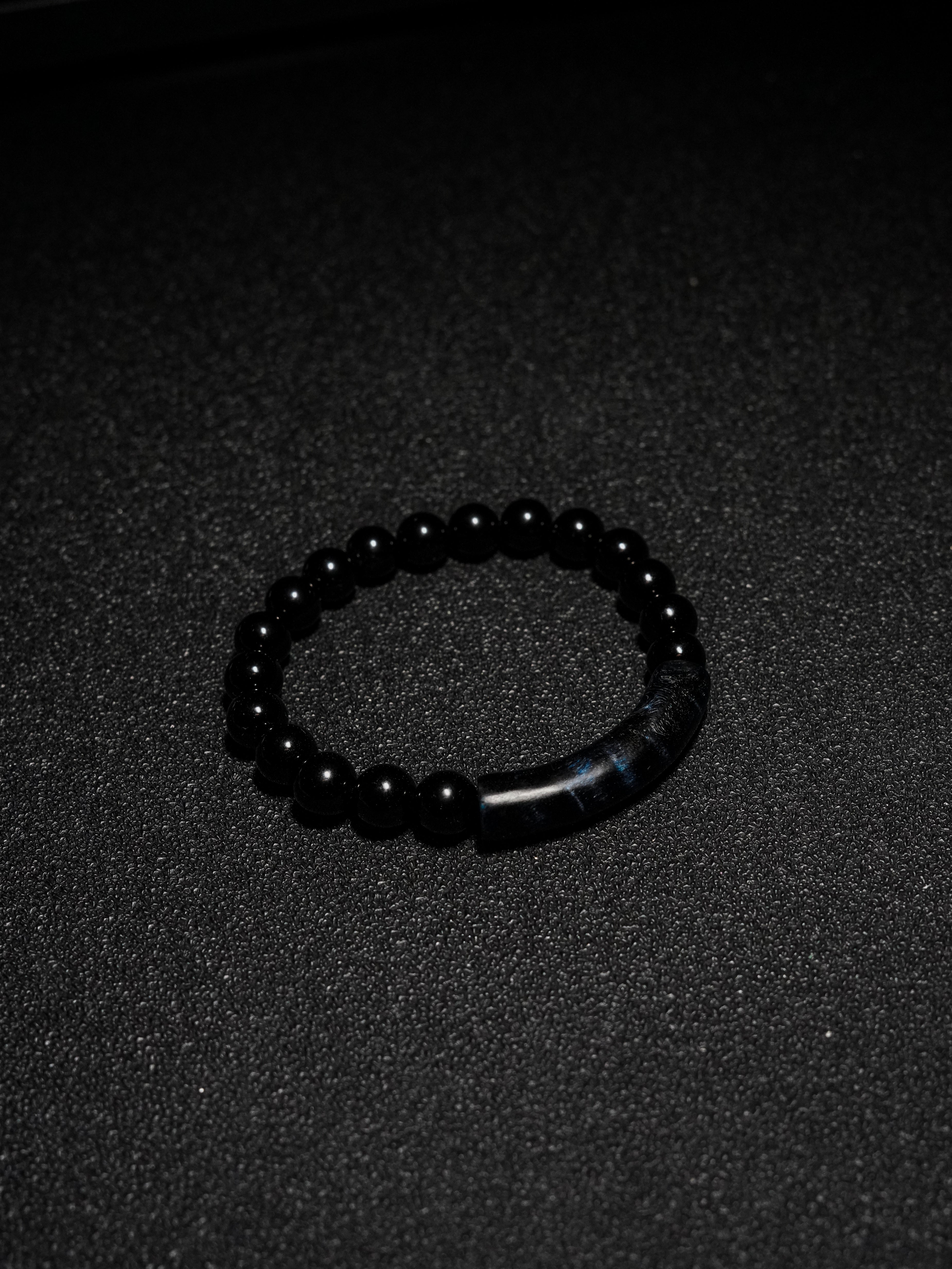 25 year series stabilized wood bracelet | Dark blue bowstring