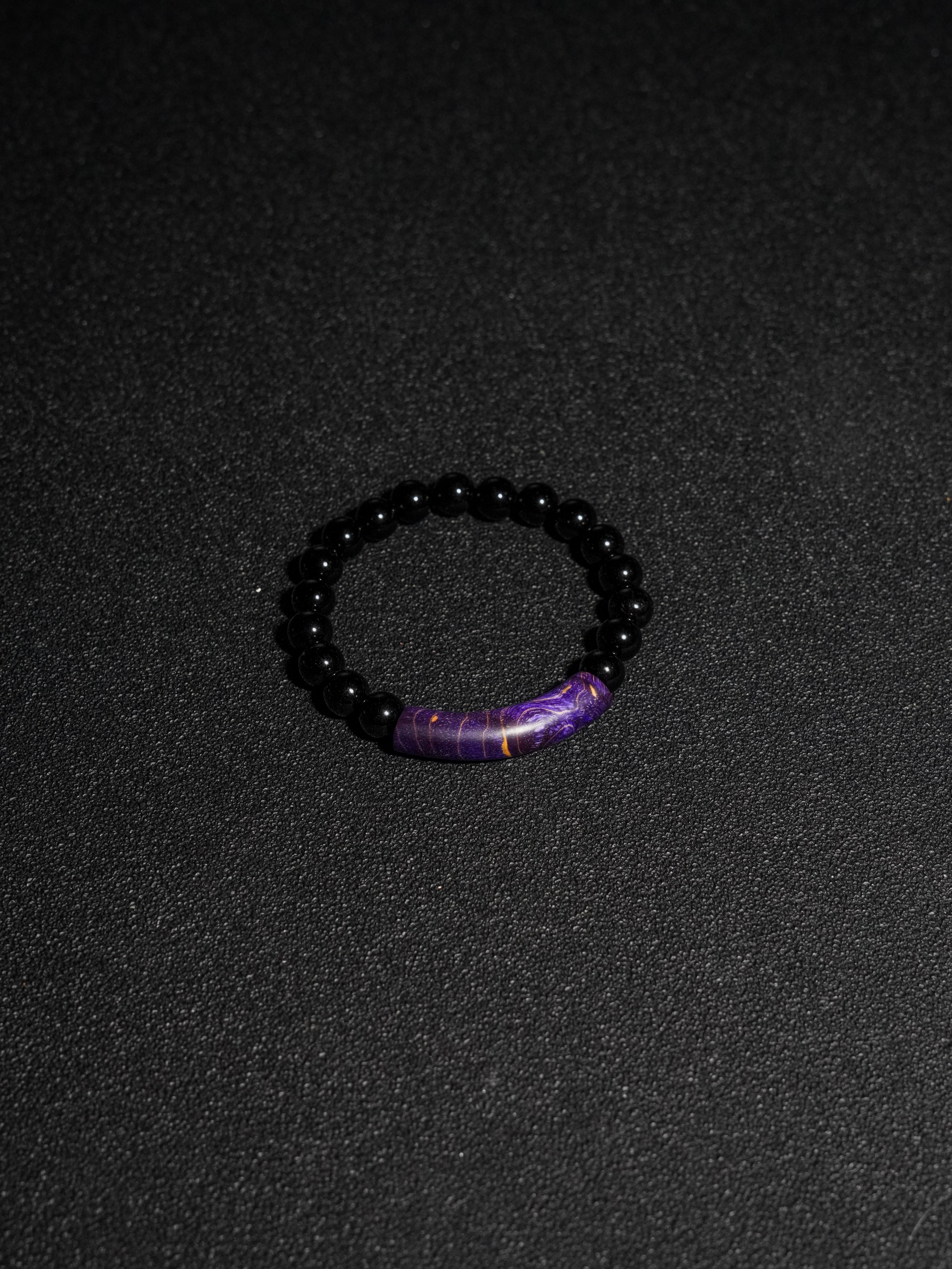 25 year series stabilized wood bracelet | Purple bowstring